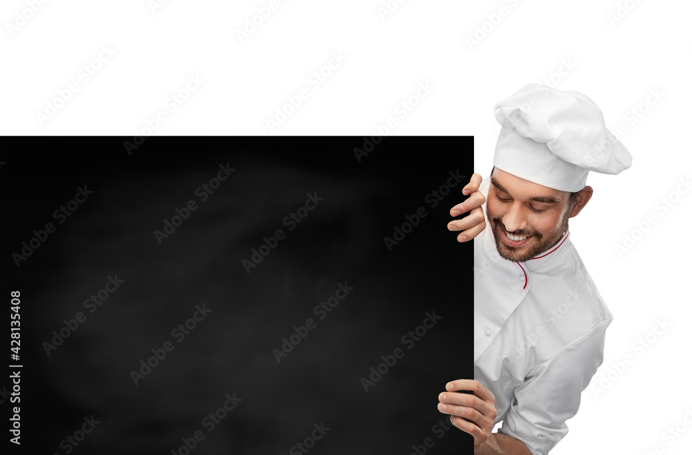 cooking, culinary and people concept - happy smiling male chef in toque with big black chalkboard white board over grey background cooking, culinary and people concept - happy smiling male chef in toque with big black chalkboard white board over grey background