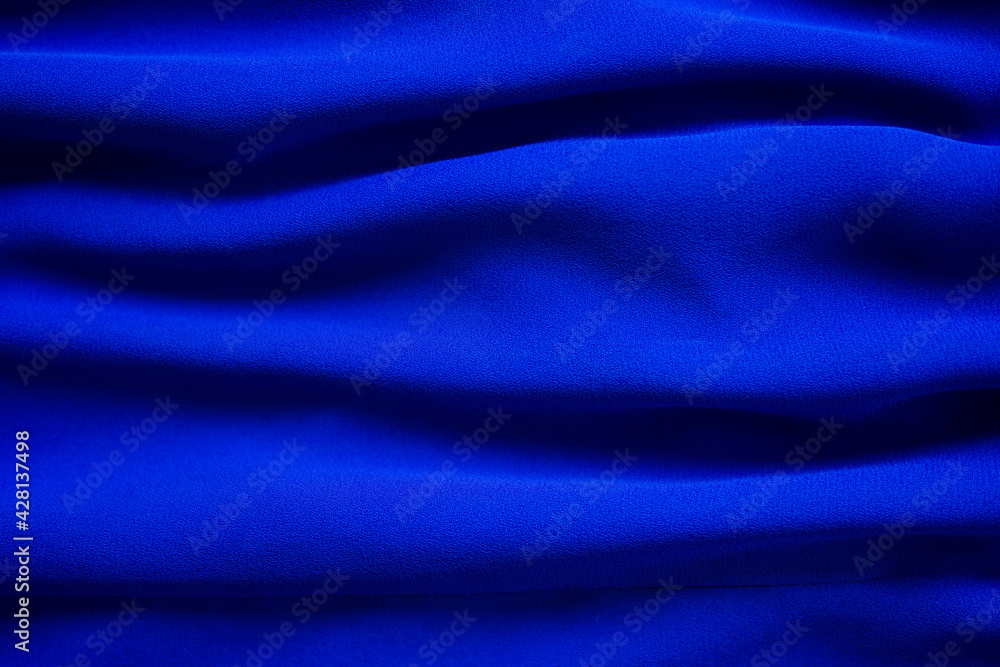 Blue fabric cotton background. display  abstract texture luxury cloth soft wave.  for well use text present or promote your goods, products on free space background. top view or flat lay.