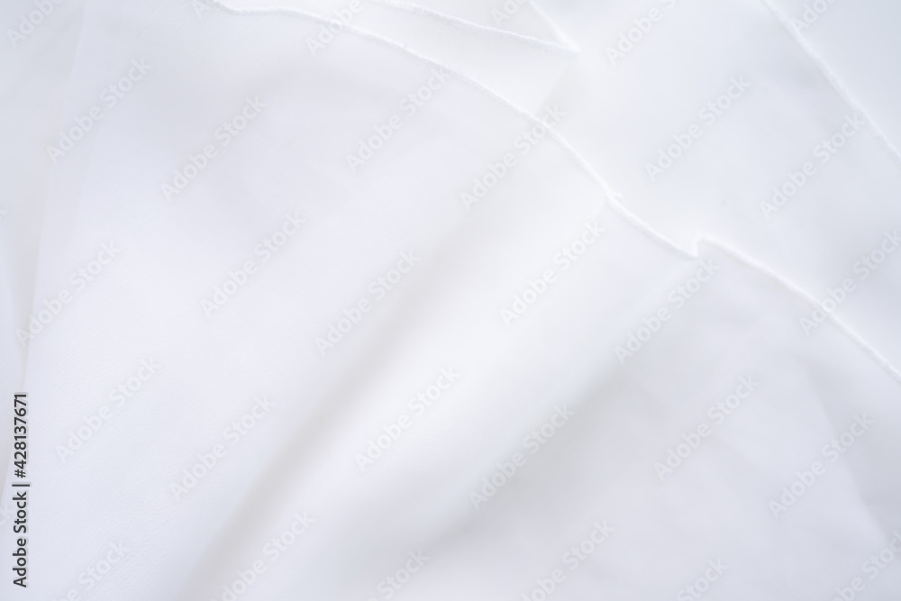 White fabric cotton background. display  abstract texture luxury cloth soft wave.  for well use text present or promote your goods, products on free space background. top view or flat lay.