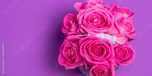 Bouquet of fresh pink roses in a bucket © FuzullHanum