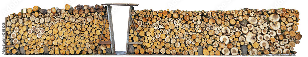 Rustic fence made from logs of firewood isolated Rustic fence made from logs of firewood isolated