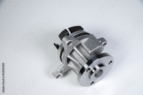 New cooling pump for internal combustion engine of a passenger car on a gray background