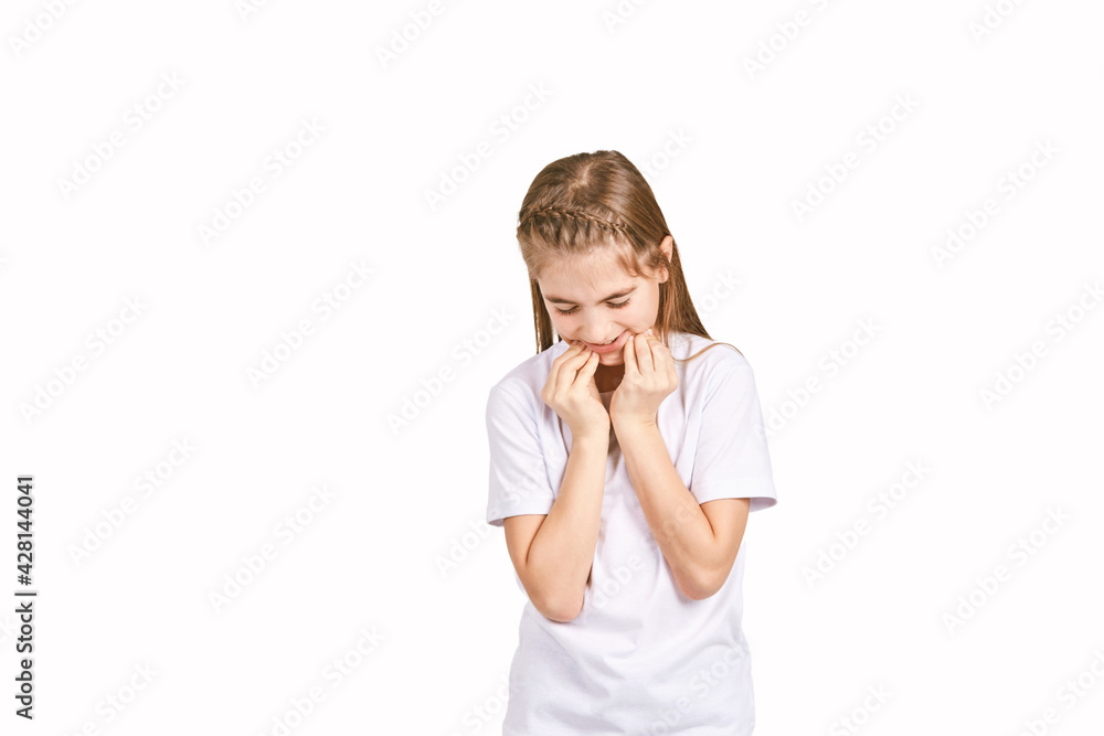 Children portrait in white t-shirt. Studio isolated concept. Toothache problem. Dental care. Bad face emergency. Girl hand near head Children portrait in white t-shirt. Studio isolated concept. Toothache problem. Dental care. Bad face emergency. Girl hand near head