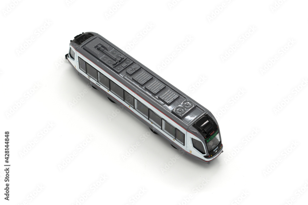 Modern toy tram isolated on white background