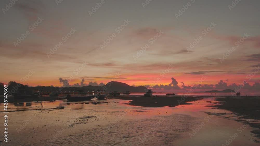 red sunrise over sea video 4K. Nature video High quality footage shot with Blackmagic pocket cinema camera 6K.
Scene of Colorful romantic sky sunrise with Changing the color of the sky background. red sunrise over sea video 4K. Nature video High quality footage shot with Blackmagic pocket cinema camera 6K.
Scene of Colorful romantic sky sunrise with Changing the color of the sky background.