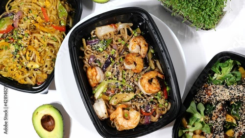 Chinese rice noodles with shrimps, vegetables, seeds