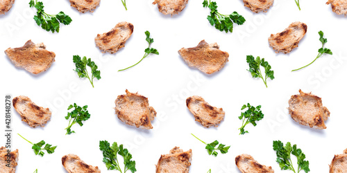 Seamless pattern with grilled pork meat slices and parsley isolated on white background, food pattern