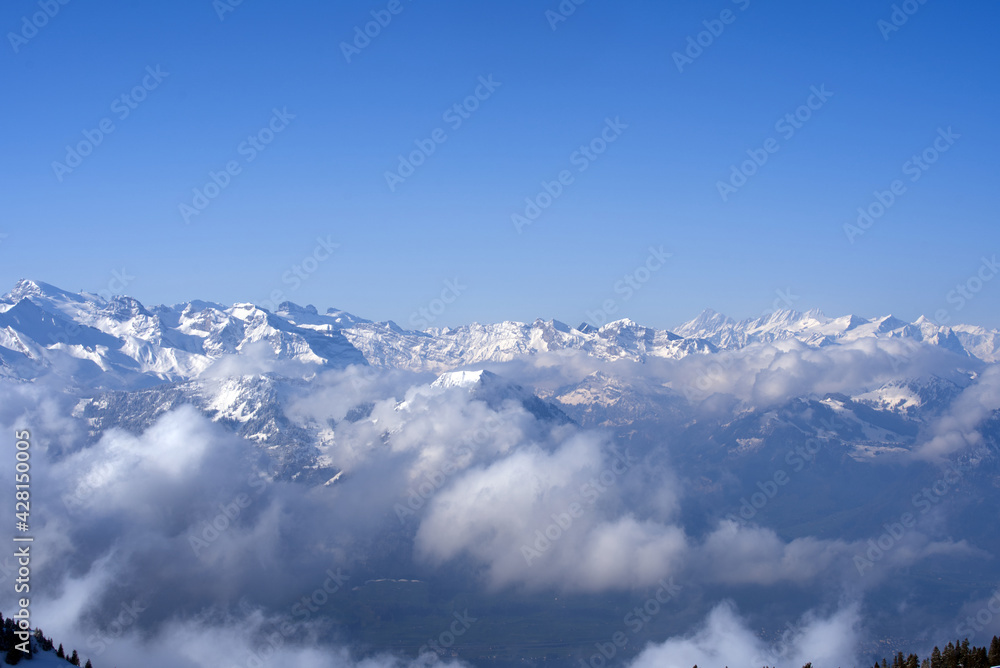View over Swiss alps from Mount Rigi, Switzerland. Photo taken April 14th, 2021, Rigi Kulm, Switzerland.
