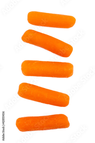 Baby cut carrots isolated on white. Vertical shot. photo