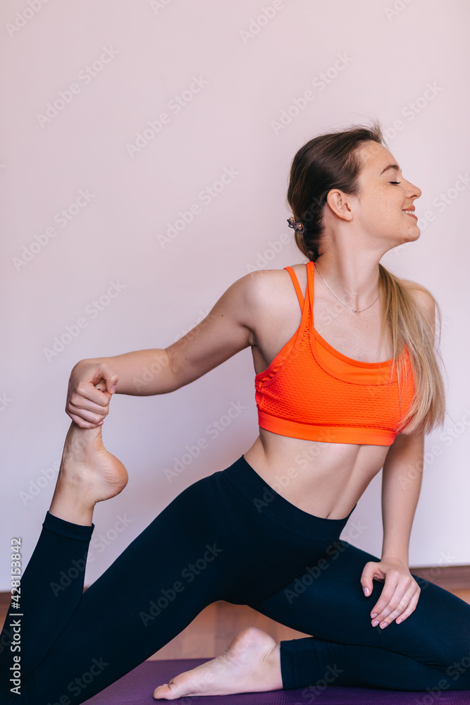 Skinny beautiful fit yoga woman in leggings and pink sport top Skinny beautiful fit yoga woman in leggings and pink sport top