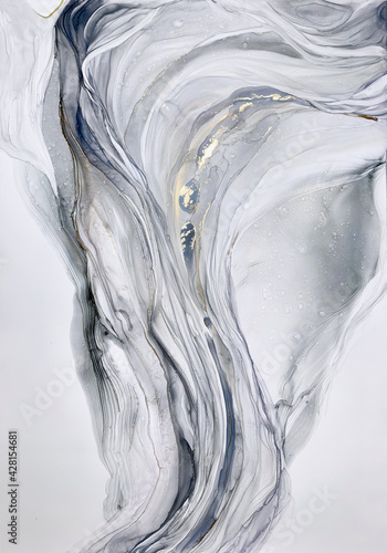 Abstract grey art with gold — marble background with beautiful smudges and stains made with alcohol ink and golden pigment. Black and white fluid texture resembles marble, watercolor or aquarelle.