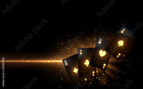 Black playing cards with gold light effect