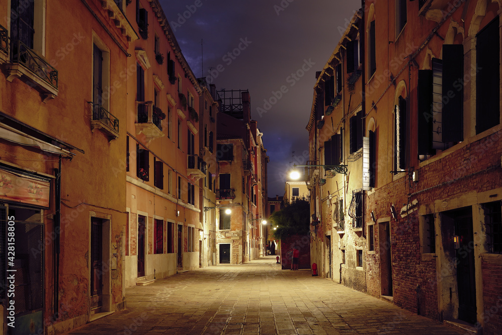 A street of Cannaregio, Venice, Italy, by night.