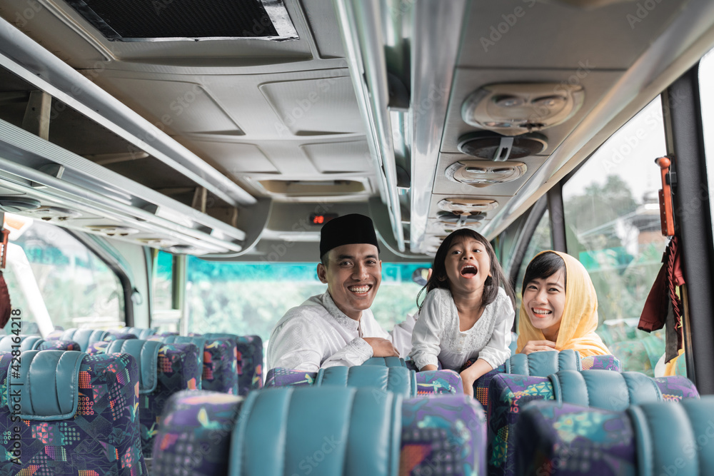 happy beautiful asian muslim holiday trip riding a bus together with family during eid mubarak celebration happy beautiful asian muslim holiday trip riding a bus together with family during eid mubarak celebration