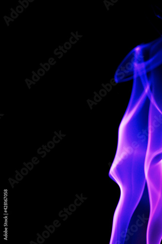 Abstract purple smoke on black background