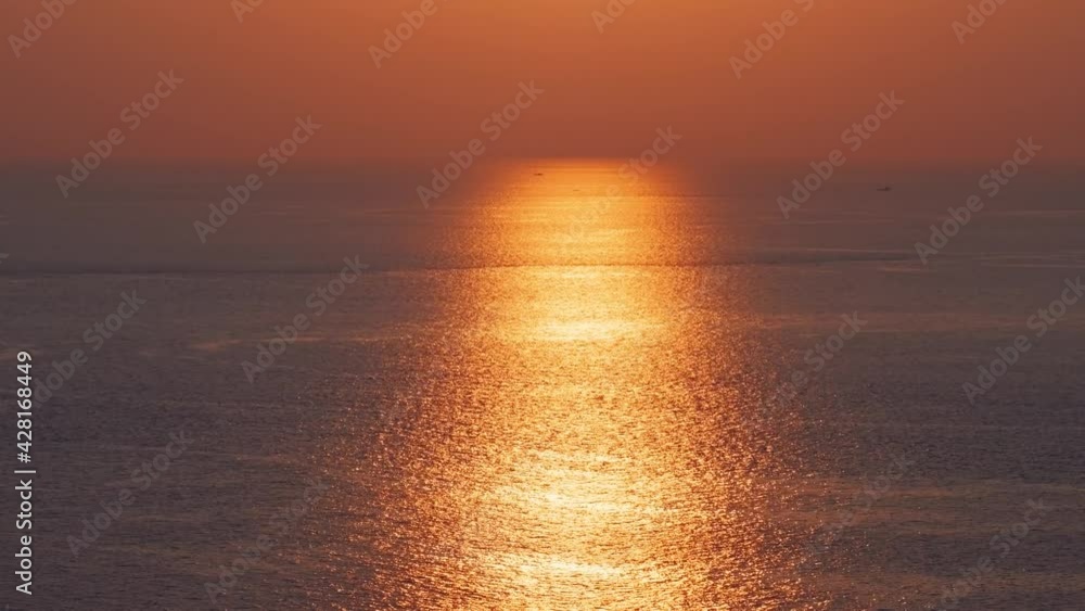 Ocean waves sunset reflected on water surface, beauty in nature sea background. 4k Beautiful sunset view on the ocean with waves and reflection. Beauty landscape twilight sunset sky above the sea. Ocean waves sunset reflected on water surface, beauty in nature sea background. 4k Beautiful sunset view on the ocean with waves and reflection. Beauty landscape twilight sunset sky above the sea.