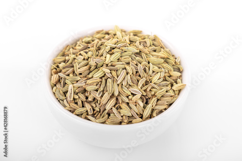 fennel seed. dry fennel seed in white bowl on white background. fennel