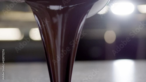 Melted Chocolate Pouring on Counter