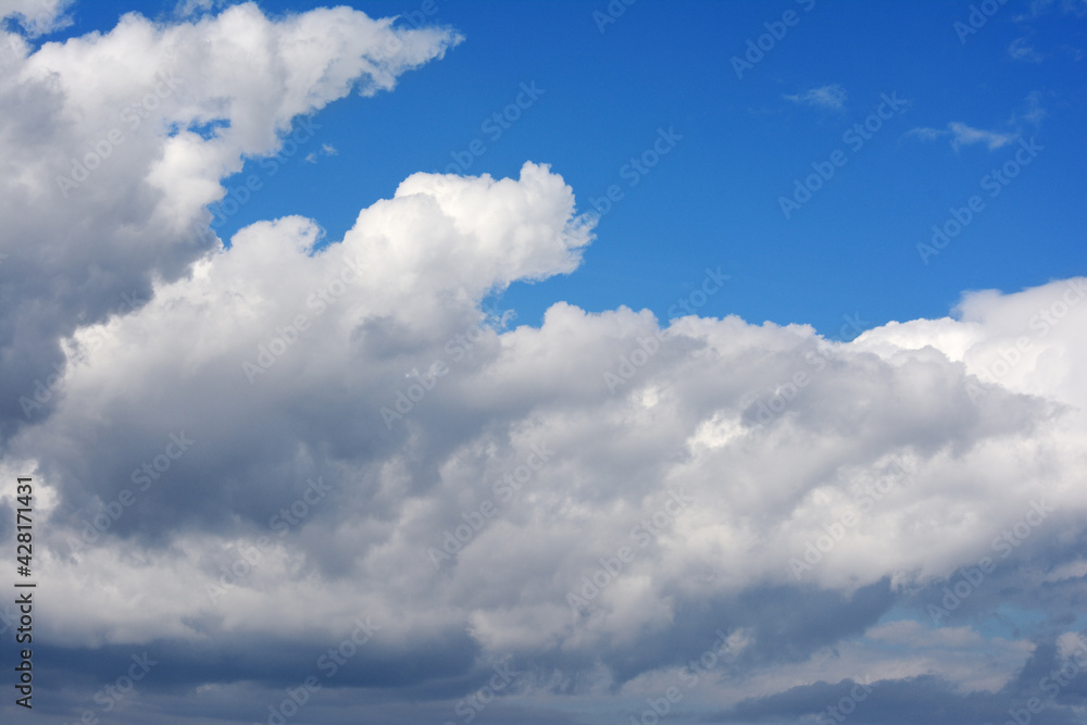 Beautiful big clouds and clear blue sky