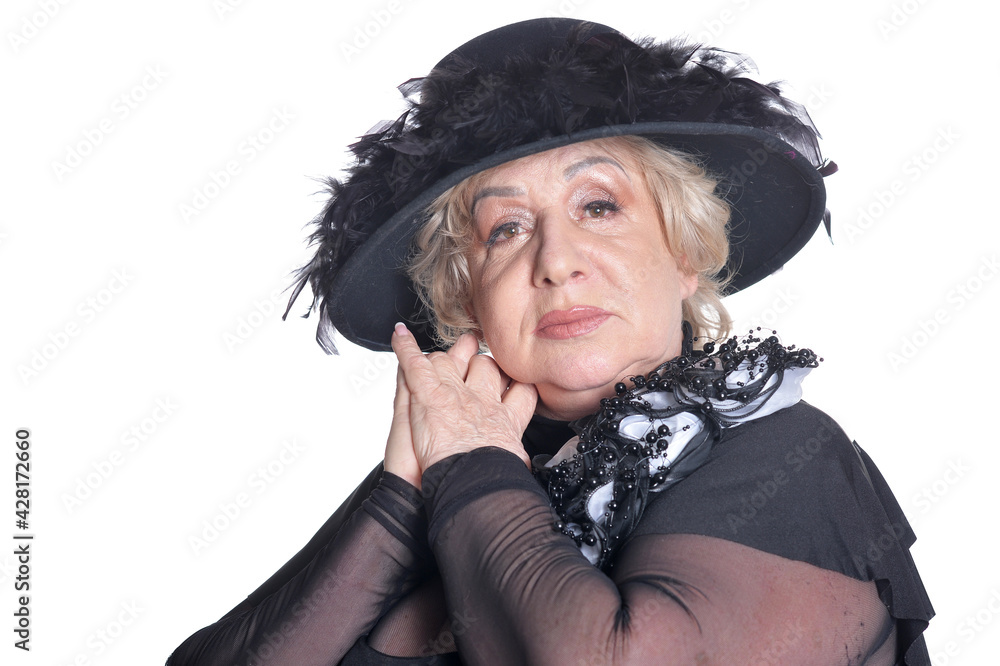 Senior woman in black hat posing Senior woman in black hat posing