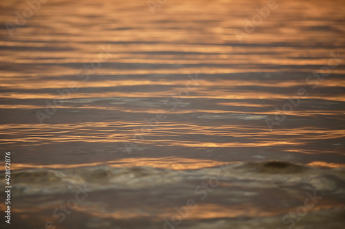 summer sun sea texture glare on the water, abstract ocean aqua background © kichigin19