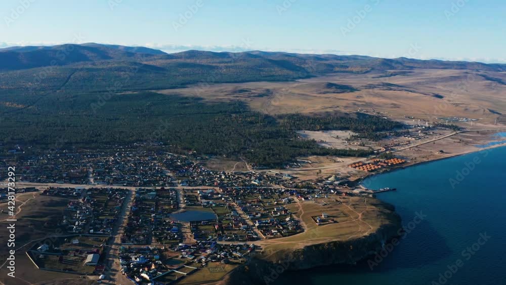 Lake Baikal in autumn. Olkhon Island. Khuzhir village. Aerial view. Lake Baikal in autumn. Olkhon Island. Khuzhir village. Aerial view.