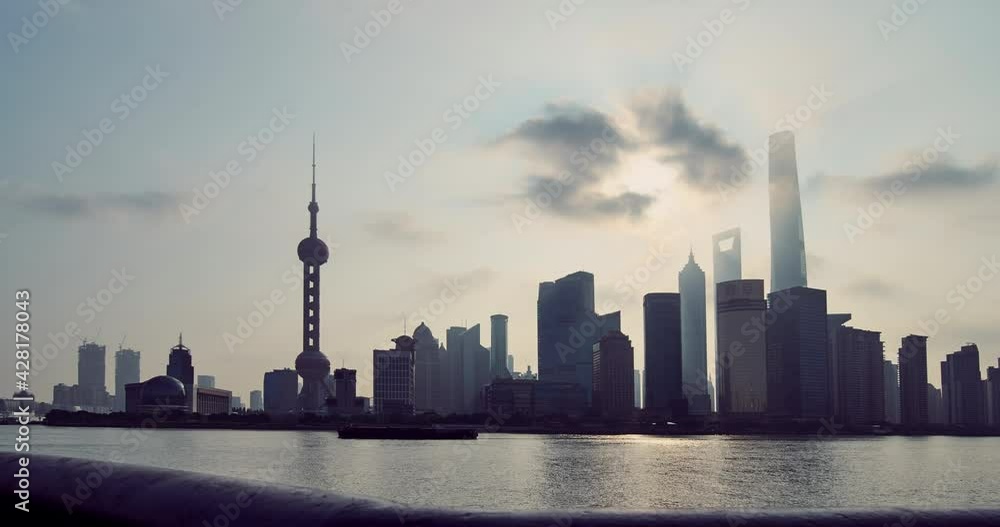 Panoramic of Shanghai Skyline Silhouette at Morning sunlight. Lujiazui Financial District and Huangpu River, China (Time-lapse) Panoramic of Shanghai Skyline Silhouette at Morning sunlight. Lujiazui Financial District and Huangpu River, China (Time-lapse)