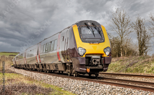 Diesel train on mainline in England, United Kingdom
