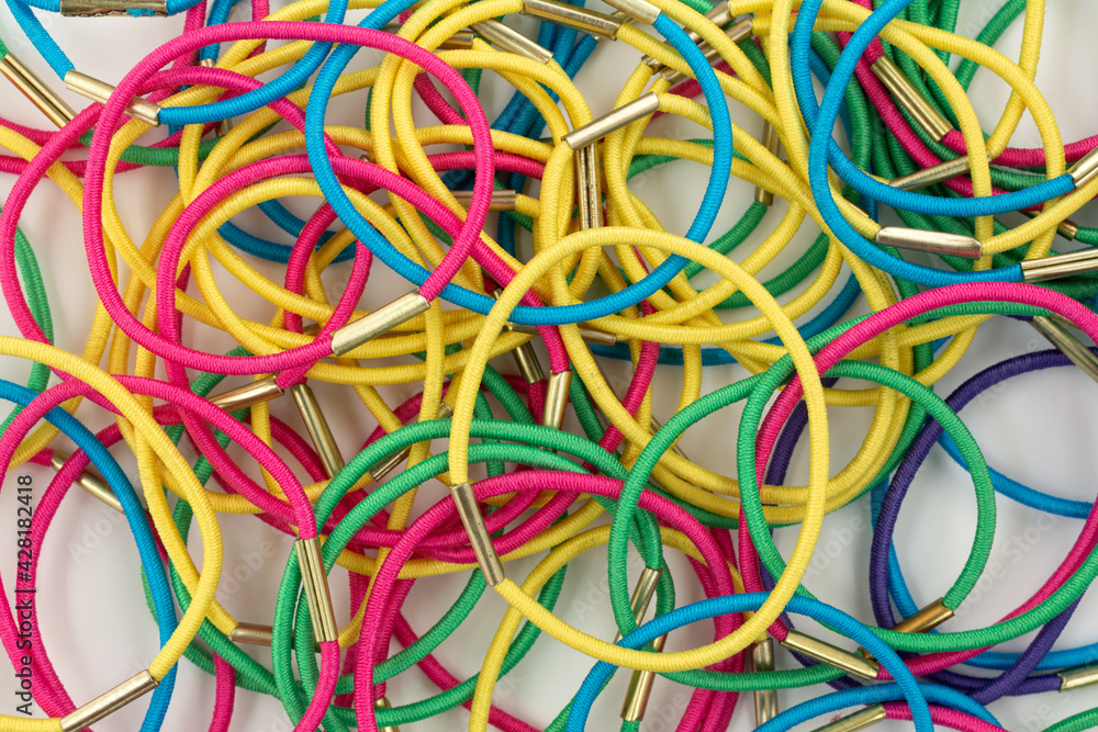 Close view of cloth covered colorful elastic hair bands
