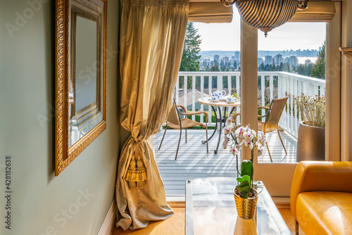 Fragment of interior design of a luxury boutique living room with balcony.