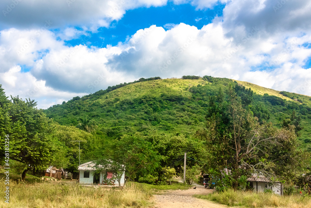 Cuban rural landscape with a hill and green vegetation Cuban rural landscape with a hill and green vegetation