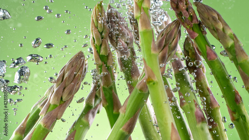 asparagus in water with spl...