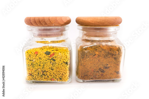spices in jars on a white