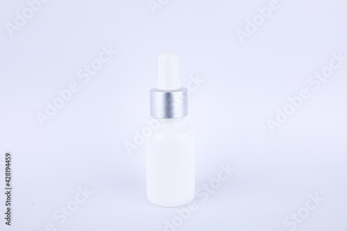 cosmetic bottles with grey stopper