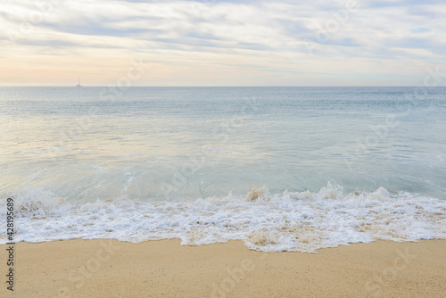 Set of six pictures of a fantastic ocean wave in different stages. Cloudy sunrise sky. San Jose del Cabo. Mexico.