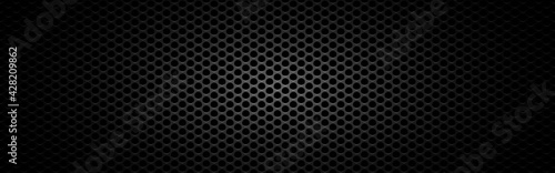 Metal mesh wide. Black steel texture. Futuristic carbon design with light. Sheet metal effect. Perforated plate. Dark material with round cells. Vector illustration