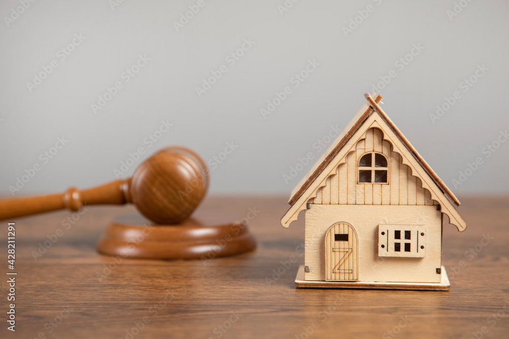 law judge gavel with house model law judge gavel with house model