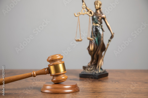 lady of justice with scales and wooden gavel