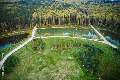 Aerial view of public park with ponds and footpaths