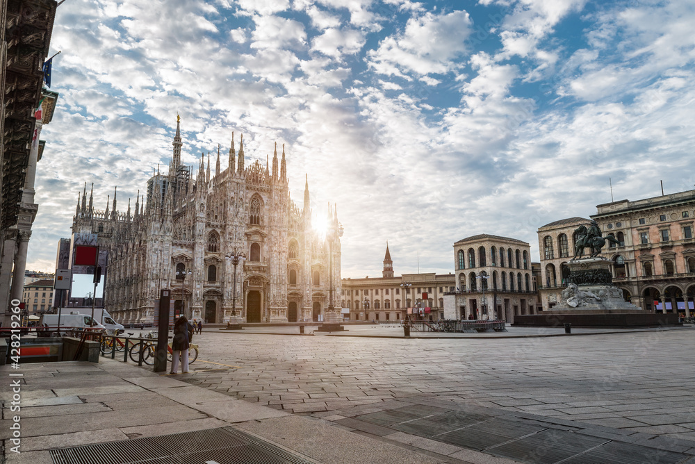 Milan city at sunrise, Italy. Milan Duomo or Milan cathedral in the historic center of the city                       