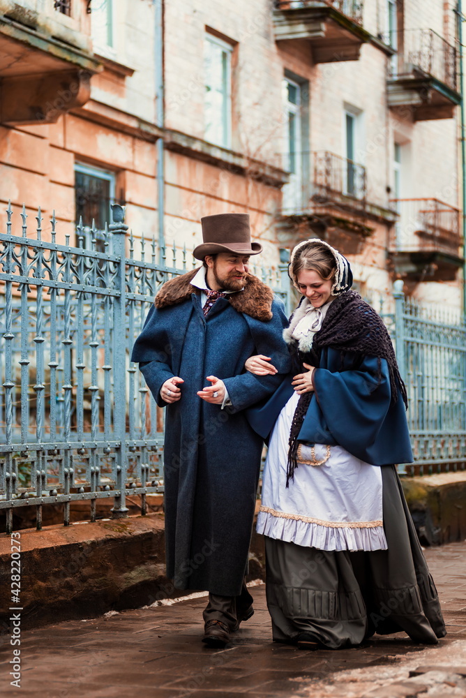 Fototapeta premium A man in a nineteenth century suit and a woman in a historical dress.