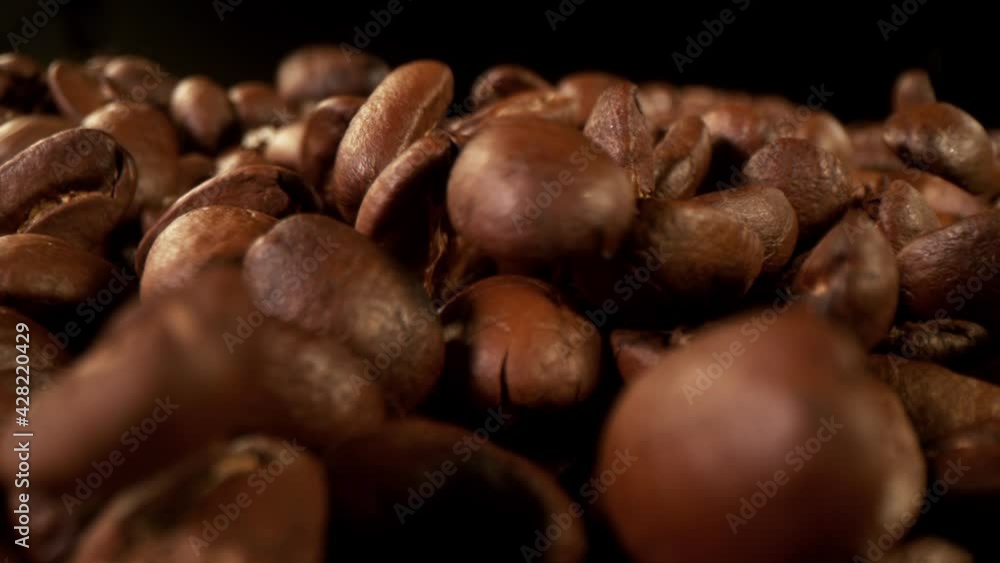 Super slow motion of falling coffee beans. Filmed on high speed cinema camera, 1000 fps. Super slow motion of falling coffee beans. Filmed on high speed cinema camera, 1000 fps.