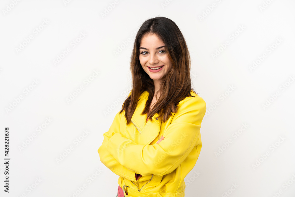 Young caucasian woman isolated on white background with arms crossed and looking forward Young caucasian woman isolated on white background with arms crossed and looking forward