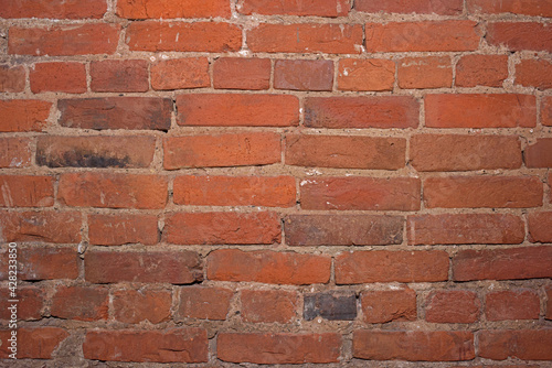 Wall of red rectangular bricks