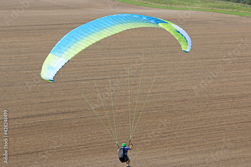 Paraglider flying at Milk Hill, Wiltshire	