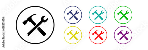 Hammer and wrench, icon in different colors. 