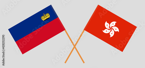 Crossed flags of Liechtenstein and Hong Kong. Official colors. Correct proportion