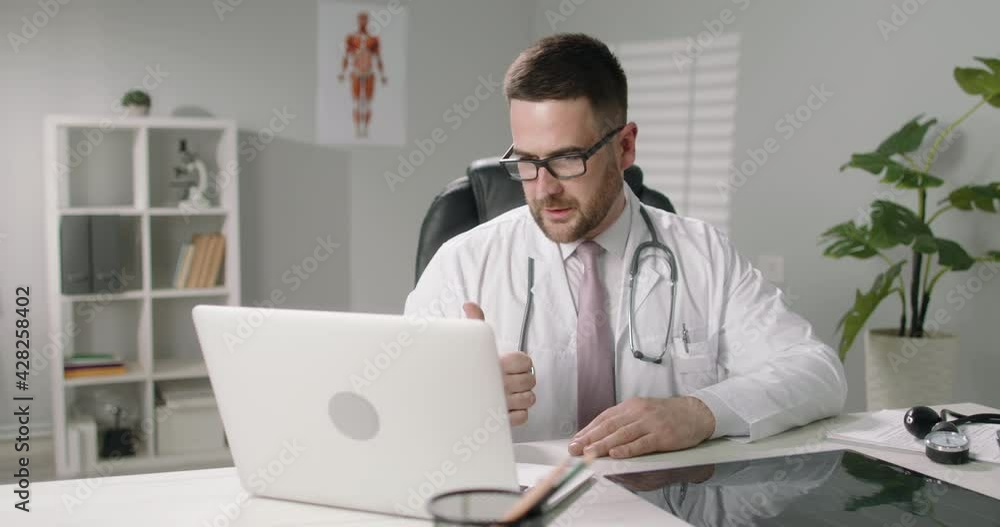 Doctor having an online appointment with a patient. Healthcare professional doing a video chat, remotely consulting a patient - online doctor, health and saftey 4k footage Doctor having an online appointment with a patient. Healthcare professional doing a video chat, remotely consulting a patient - online doctor, health and saftey 4k footage