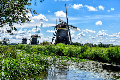 Molens. Typical Dutch landscape with traditional Dutch windmills in Leidschendam, The Netherlands., Holland, Europe photo