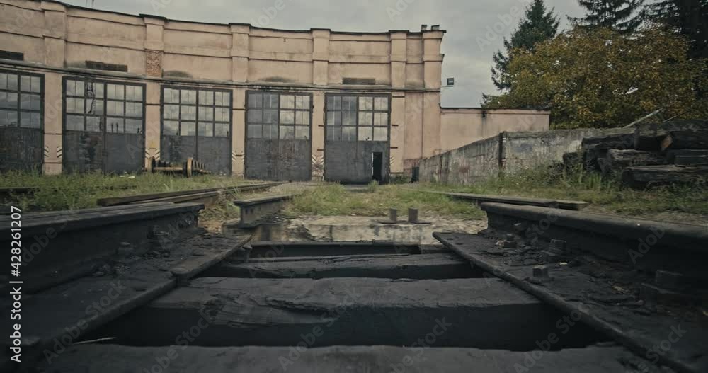 Cinemaatic shot of roundhouse and railway turntable at the old locomotive depot. 4k Cinemaatic shot of roundhouse and railway turntable at the old locomotive depot. 4k